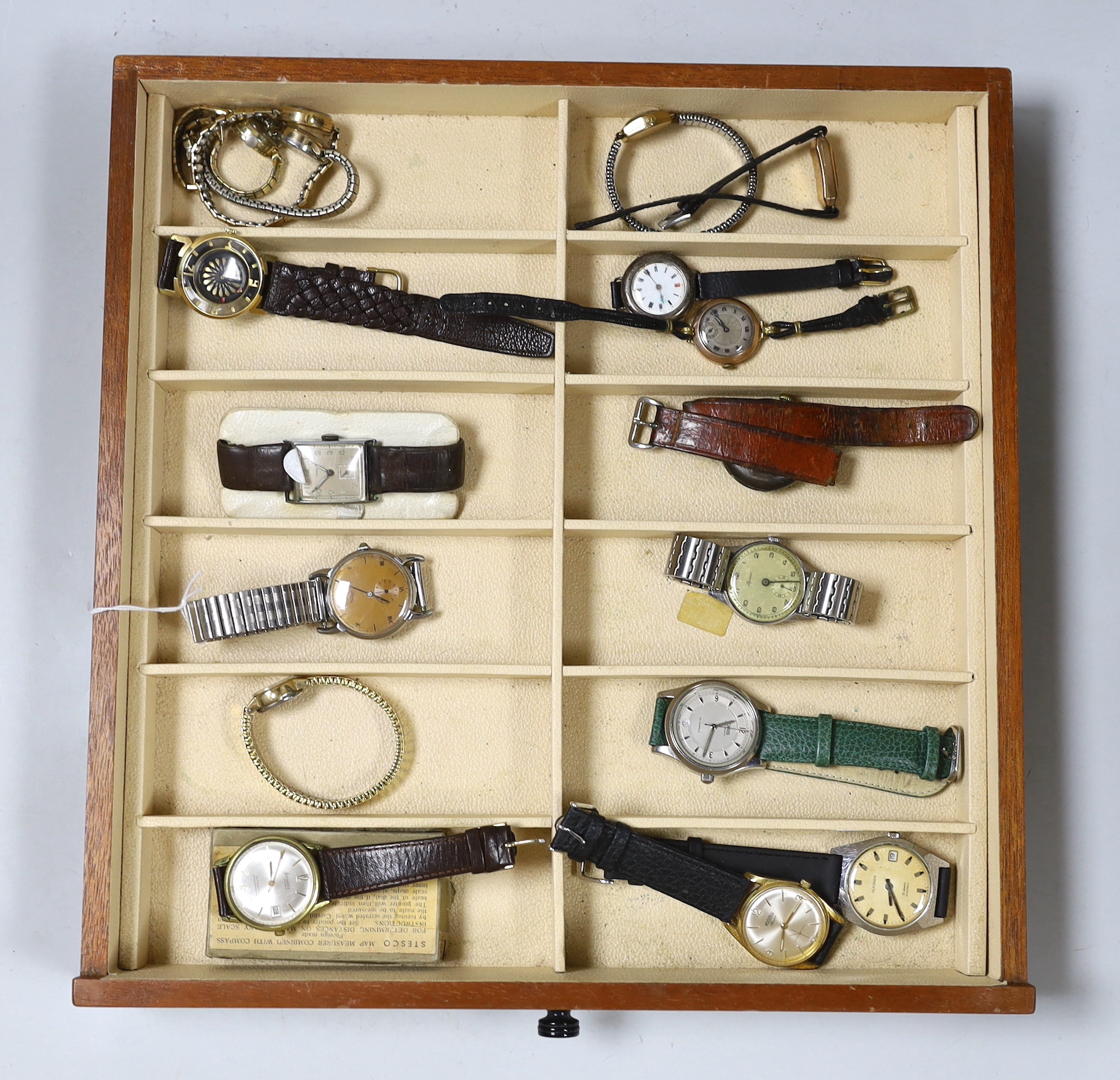 Seventeen assorted lady's or gentleman's wrist watches including a silver manual wind Omega, circa 1917 and a stainless steel Tudor, together with a pedometer?